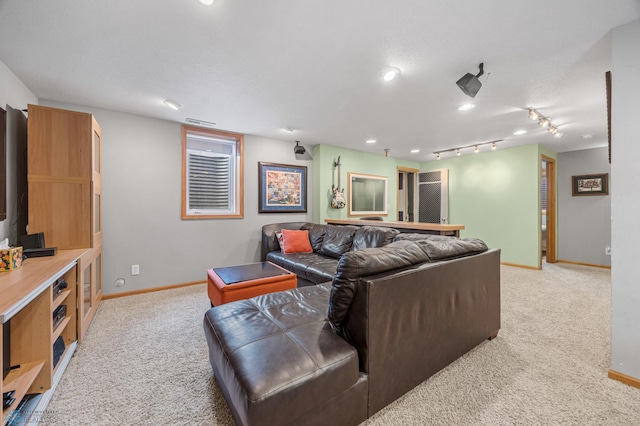 122 15th Ave E, Fargo, ND 58078 - living area featuring light colored carpet and recessed lighting