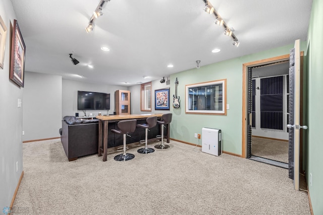 122 15th Ave E, Fargo, ND 58078 - carpeted living room featuring recessed lighting and track lighting