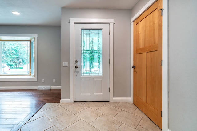 1430 Hoot Lake Dr, Fergus Falls, MN 56537 - entryway with plenty of natural light, recessed lighting, and light tile patterned flooring