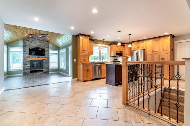 1430 Hoot Lake Dr, Fergus Falls, MN 56537 - kitchen featuring stainless steel appliances, open floor plan, recessed lighting, ceiling fan, and a stone fireplace