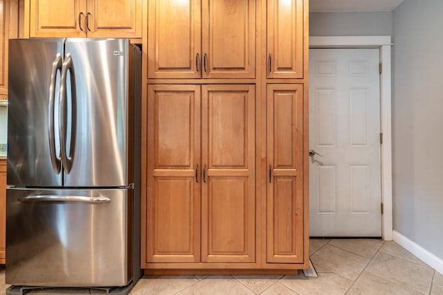 1430 Hoot Lake Dr, Fergus Falls, MN 56537 - kitchen with freestanding refrigerator and light tile patterned flooring