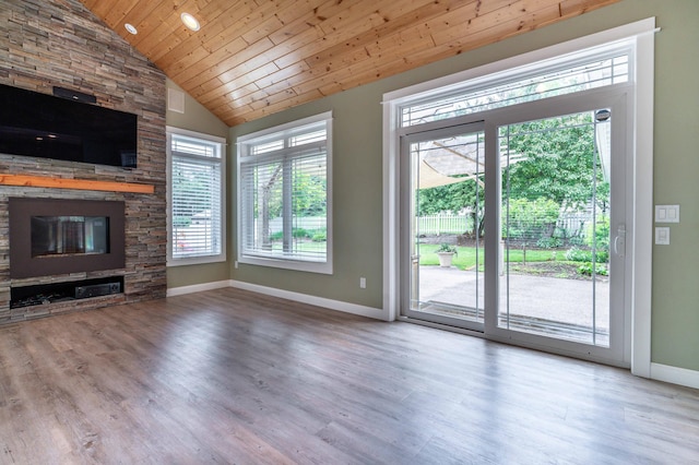 1430 Hoot Lake Dr, Fergus Falls, MN 56537 - unfurnished living room with plenty of natural light, wooden ceiling, wood finished floors, a fireplace, and high vaulted ceiling