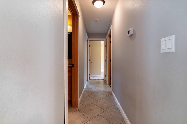 1430 Hoot Lake Dr, Fergus Falls, MN 56537 - hallway with light tile patterned floors and baseboards