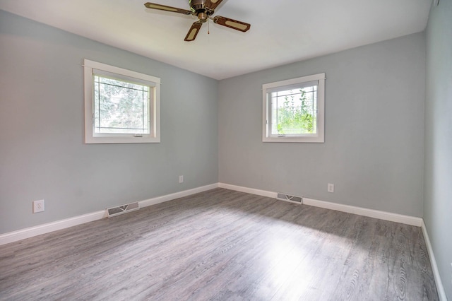 1430 Hoot Lake Dr, Fergus Falls, MN 56537 - unfurnished room with wood finished floors and a ceiling fan
