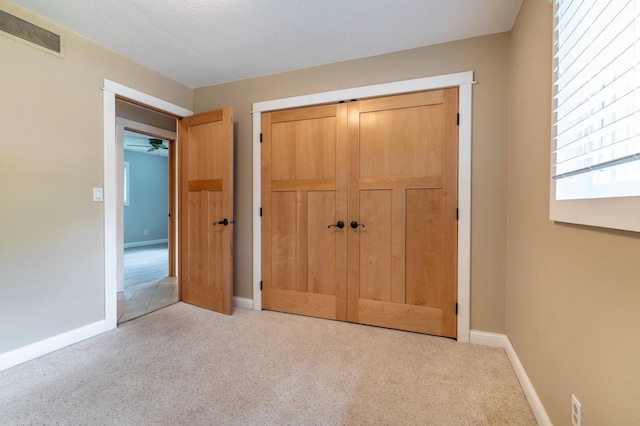 1430 Hoot Lake Dr, Fergus Falls, MN 56537 - unfurnished bedroom with carpet flooring and a closet