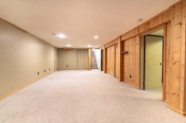 1430 Hoot Lake Dr, Fergus Falls, MN 56537 - finished basement with light carpet, stairway, recessed lighting, and wood walls