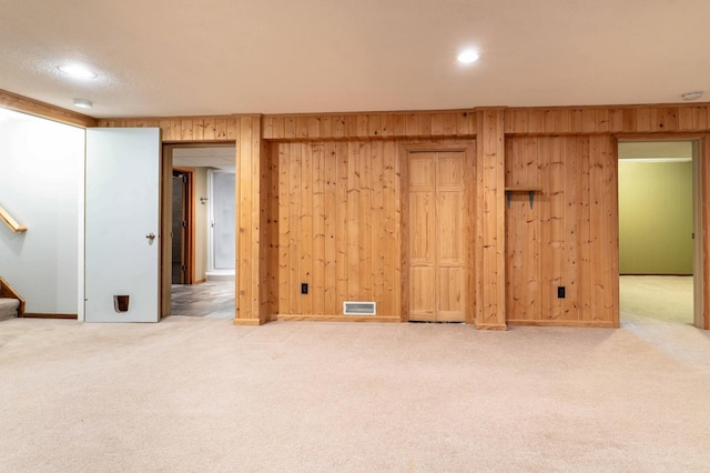 1430 Hoot Lake Dr, Fergus Falls, MN 56537 - unfurnished bedroom featuring carpet floors, wood walls, and recessed lighting