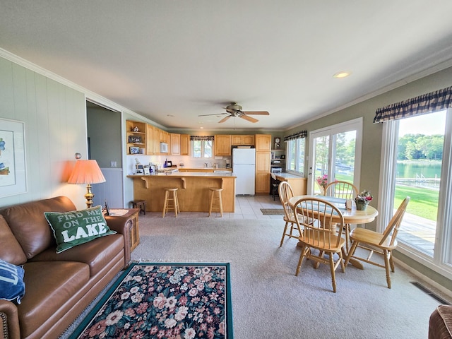 36185 Rose Lake Rd, Hobart Twp, MN 56544 - dining room featuring ornamental molding, light colored carpet, a ceiling fan, and recessed lighting