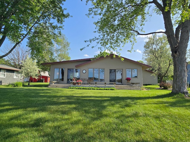 36185 Rose Lake Rd, Hobart Twp, MN 56544 - rear view of property with a lawn