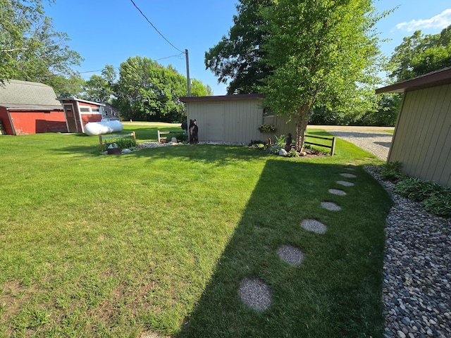 36185 Rose Lake Rd, Hobart Twp, MN 56544 - view of grassy yard featuring a storage shed