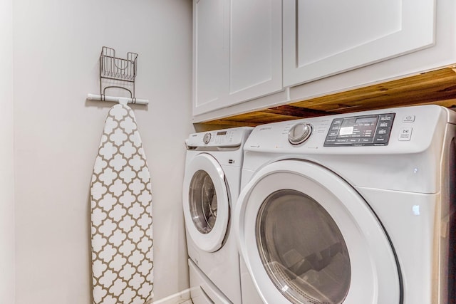 6108 Birchwood Rd, Woodbury, MN 55125 - washroom featuring separate washer and dryer and cabinet space