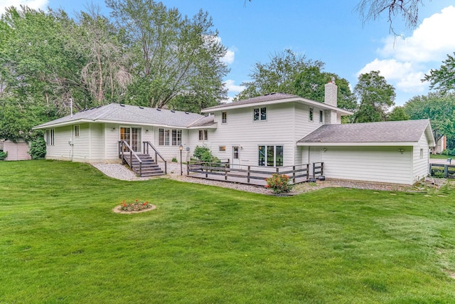 6108 Birchwood Rd, Woodbury, MN 55125 - back of property featuring a chimney and a yard