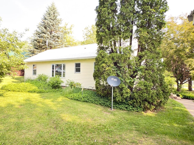 301 Maple St W, Frederic, WI 54837 - view of side of home with a yard