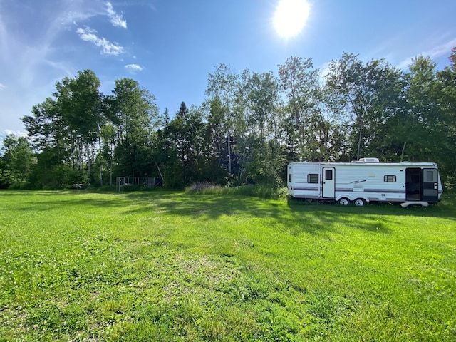 3653 Front St, Barnum, MN 55707 - view of grassy yard featuring view of wooded area