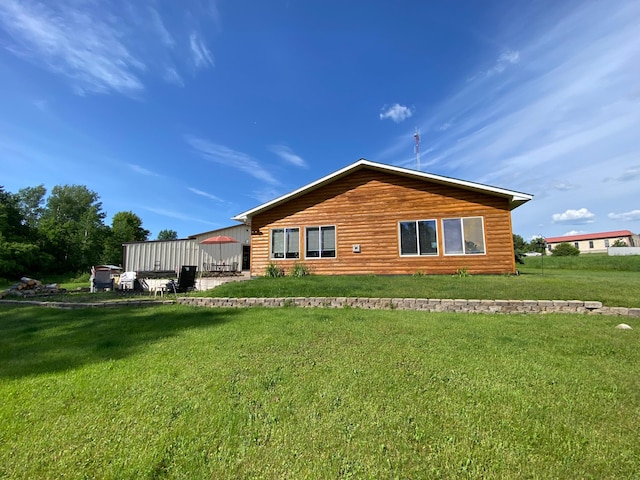 3653 Front St, Barnum, MN 55707 - back of property featuring a yard