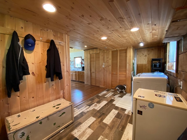 3653 Front St, Barnum, MN 55707 - mudroom featuring wooden walls, wood-type flooring, wooden ceiling, a wood stove, and recessed lighting