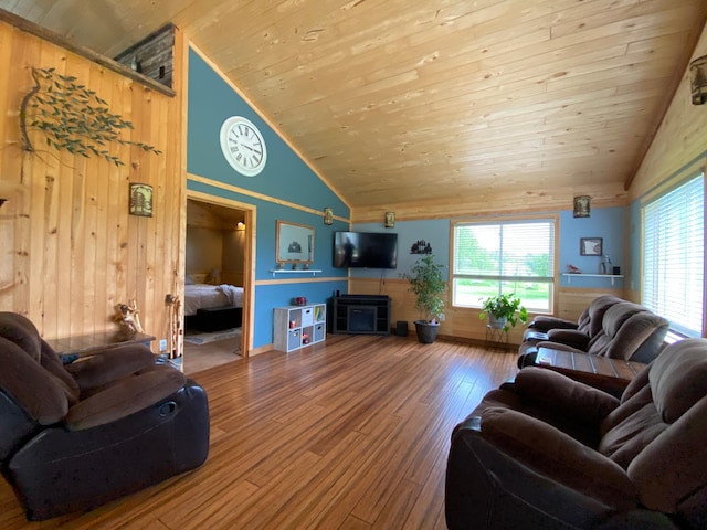 3653 Front St, Barnum, MN 55707 - living area with wood finished floors, wood walls, wood ceiling, and high vaulted ceiling