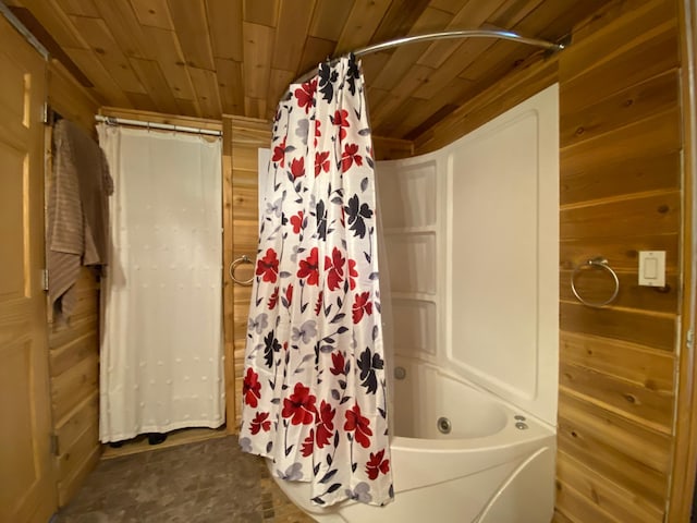 3653 Front St, Barnum, MN 55707 - bathroom with wooden ceiling, wooden walls, and shower / bath combo