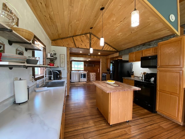 3653 Front St, Barnum, MN 55707 - kitchen with black appliances, wooden counters, open shelves, dark wood-style floors, and lofted ceiling