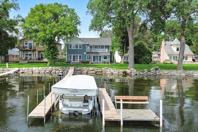 5459 Bartlett Blvd, Mound, MN 55364 - dock area featuring a water view, a lawn, a balcony, and boat lift