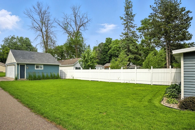 5459 Bartlett Blvd, Mound, MN 55364 - view of yard with an outdoor structure and a detached garage