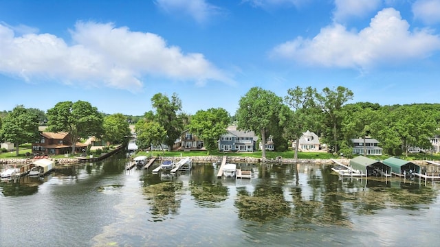 5459 Bartlett Blvd, Mound, MN 55364 - water view featuring a dock and nearby suburban area