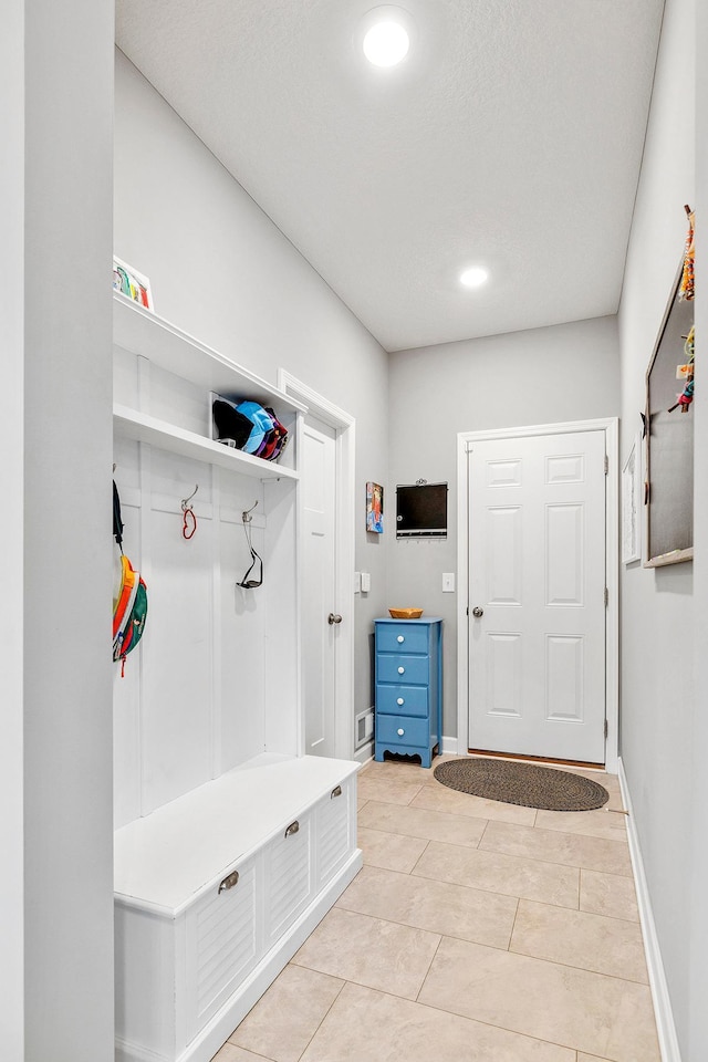 6439 Alvina Ct, Inver Grove Heights, MN 55077 - mudroom with light tile patterned flooring and recessed lighting