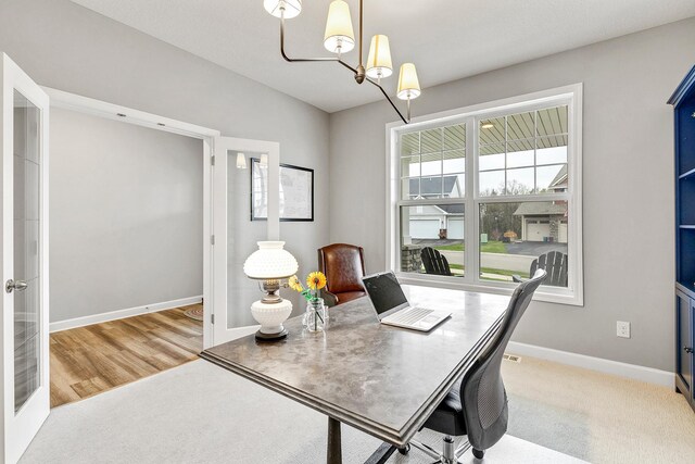 6439 Alvina Ct, Inver Grove Heights, MN 55077 - office space featuring a chandelier and wood finished floors