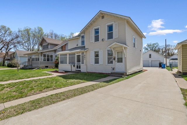 821 5th St, Winona, MN 55987 - view of front of house with a garage, a sunroom, an outbuilding, entry steps, and a front yard