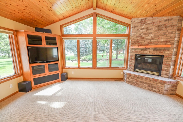 2303 Parkview Rd NE, Alexandria, MN 56308 - unfurnished living room with lofted ceiling, a brick fireplace, and carpet flooring