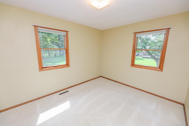 2303 Parkview Rd NE, Alexandria, MN 56308 - empty room featuring light colored carpet and baseboards