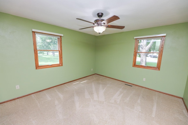 2303 Parkview Rd NE, Alexandria, MN 56308 - carpeted spare room with plenty of natural light and a ceiling fan