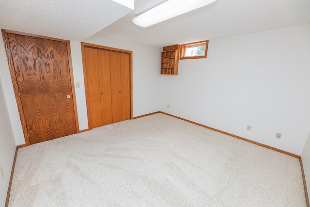 2303 Parkview Rd NE, Alexandria, MN 56308 - unfurnished bedroom featuring carpet floors and a closet