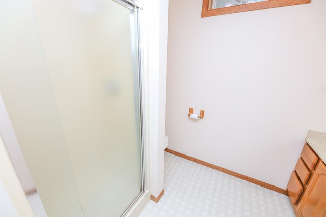 2303 Parkview Rd NE, Alexandria, MN 56308 - full bathroom with tile patterned floors, a stall shower, and vanity