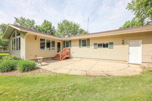 2303 Parkview Rd NE, Alexandria, MN 56308 - rear view of house featuring a patio area and a yard
