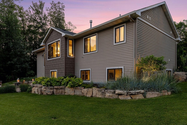 12105 285th St, Lindstrom, MN 55045 - view of home's exterior featuring a lawn