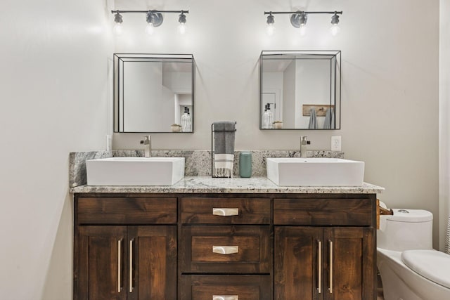 12105 285th St, Lindstrom, MN 55045 - full bathroom featuring double vanity and toilet