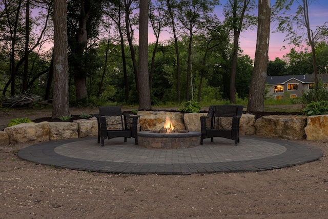 12105 285th St, Lindstrom, MN 55045 - view of patio featuring an outdoor fire pit
