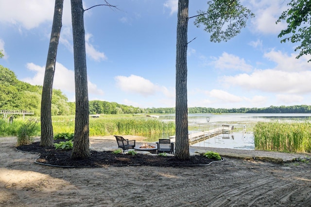 12105 285th St, Lindstrom, MN 55045 - surrounding community featuring a boat dock, a water view, and a fire pit