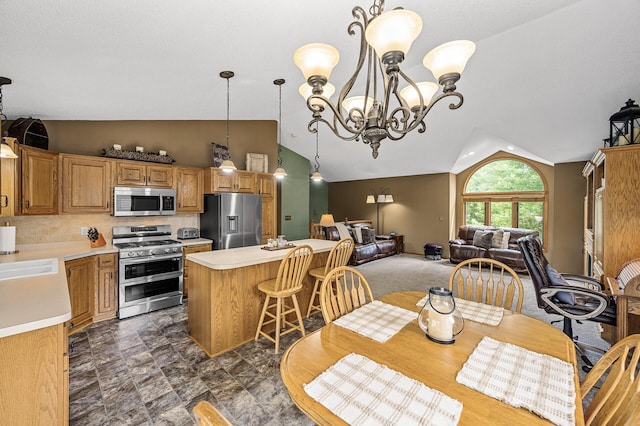 3894 Kestrel St SW, Prior Lake, MN 55372 - dining space with vaulted ceiling and a chandelier