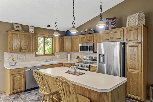 3894 Kestrel St SW, Prior Lake, MN 55372 - kitchen with stainless steel appliances, a textured ceiling, lofted ceiling, backsplash, and light countertops