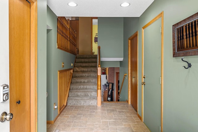 3894 Kestrel St SW, Prior Lake, MN 55372 - stairway featuring stone finish floors and recessed lighting
