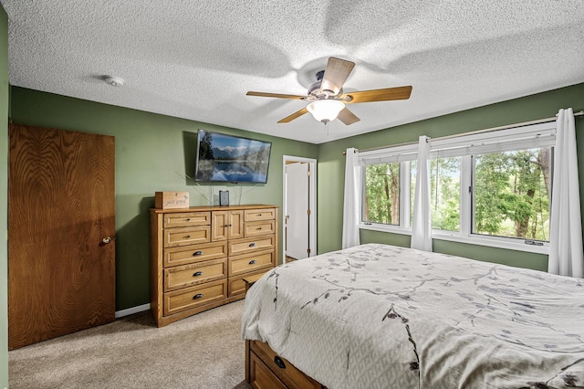 3894 Kestrel St SW, Prior Lake, MN 55372 - bedroom with light carpet, a ceiling fan, and a textured ceiling