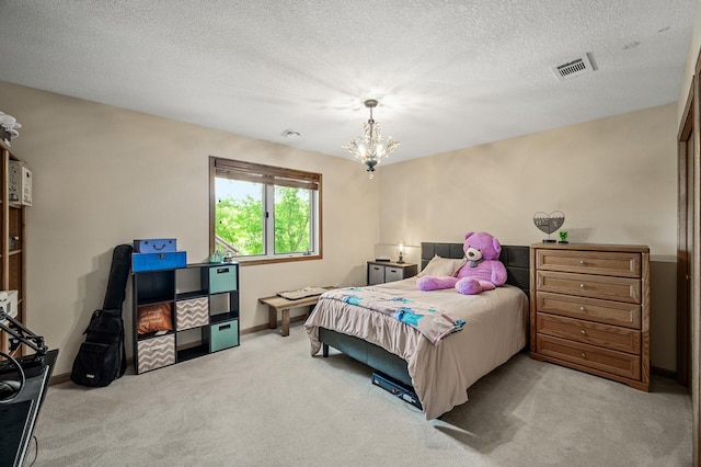 3894 Kestrel St SW, Prior Lake, MN 55372 - bedroom featuring carpet flooring, a chandelier, and a textured ceiling