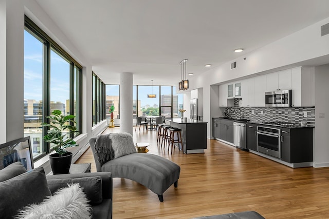 740 Portland Ave Unit 801, Minneapolis, MN 55415 - living area with light wood-style floors