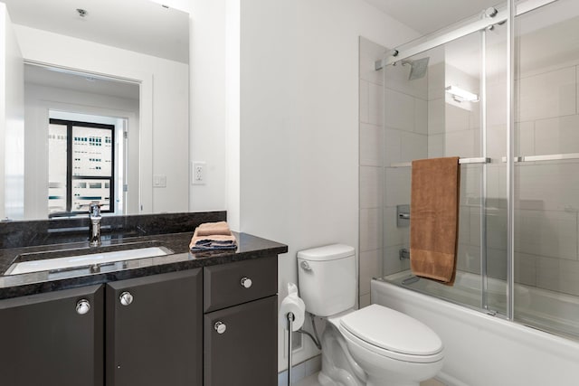740 Portland Ave Unit 801, Minneapolis, MN 55415 - bathroom featuring vanity and bath / shower combo with glass door