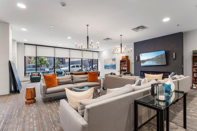 740 Portland Ave Unit 801, Minneapolis, MN 55415 - carpeted living area with a chandelier and recessed lighting