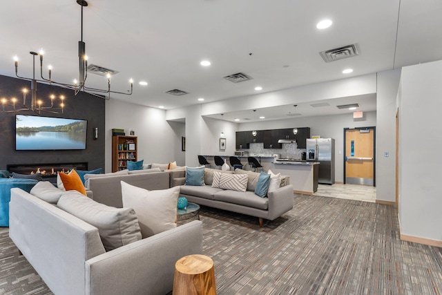 740 Portland Ave Unit 801, Minneapolis, MN 55415 - living area with a chandelier, light colored carpet, and recessed lighting