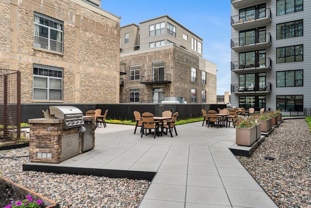740 Portland Ave Unit 801, Minneapolis, MN 55415 - view of patio / terrace with an outdoor kitchen and outdoor dining space