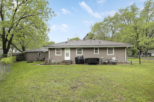 16725 Anna Trl SE, Prior Lake, MN 55372 - back of house with a fenced backyard and a chimney
